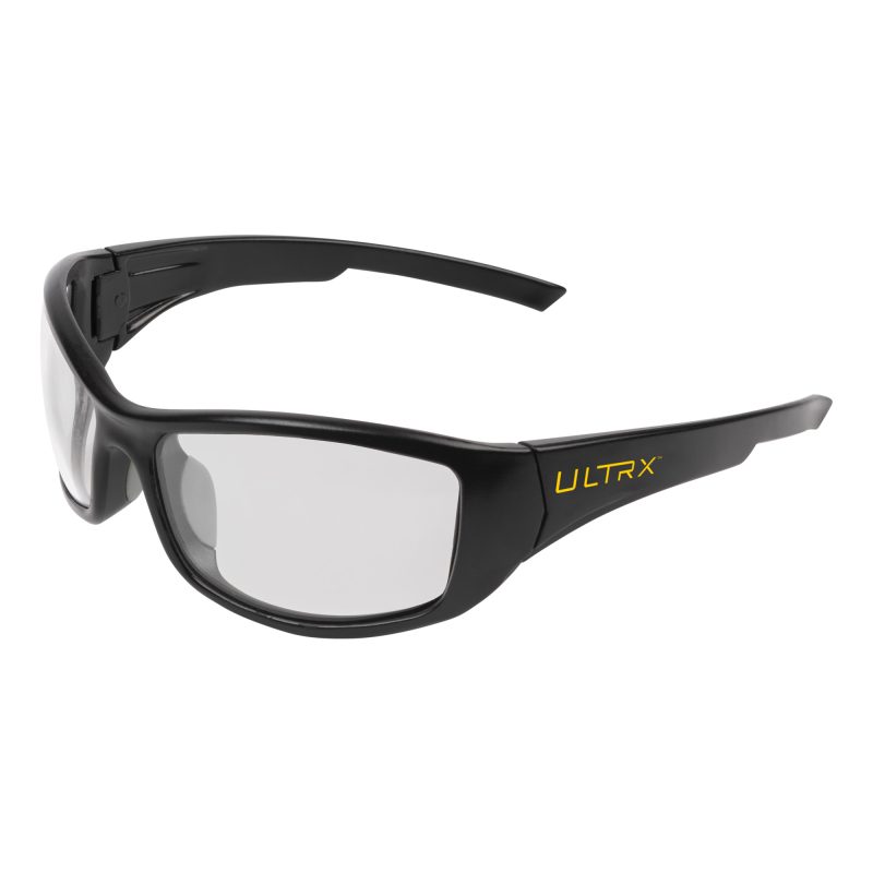 Allen Company Ultrx Sync Safety Glass Clear with black frame and clear anti-fog lenses, shown on a ranch setting.
