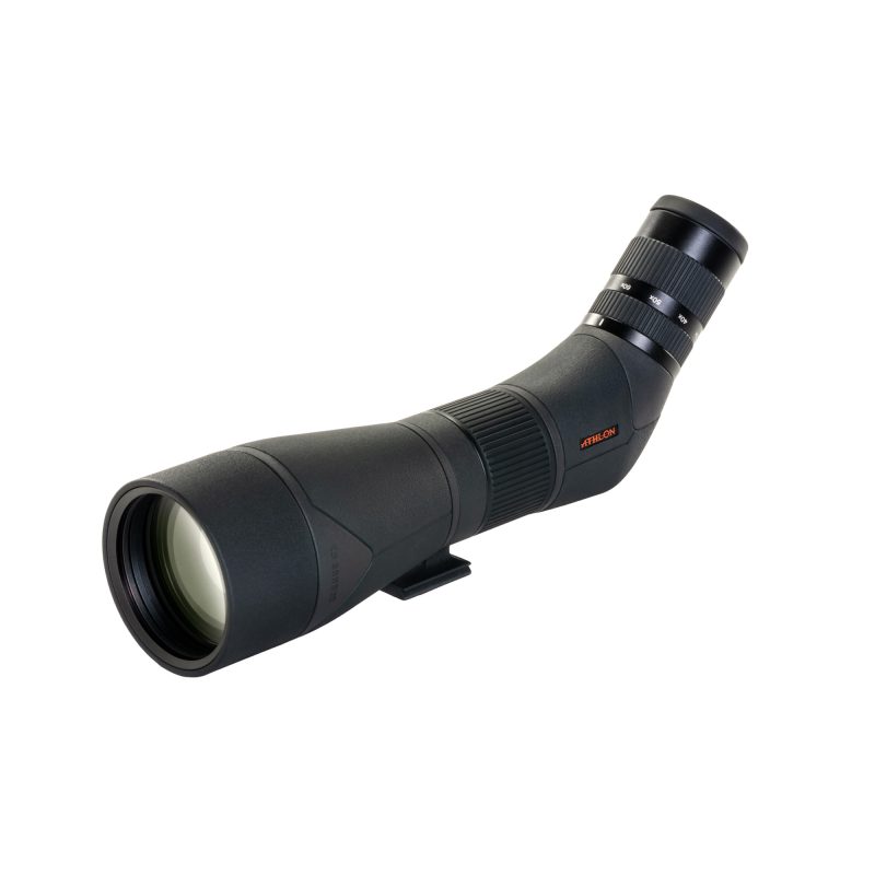 Black ATHLON Cronus G2 20-60X86 UHD spotting scope with 45-degree eyepiece on a tripod, angled for observation in an outdoor setting.