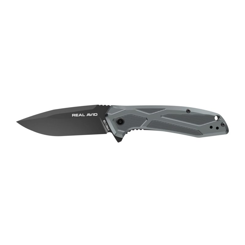 Real Avid Born Ready Blue Assisted folding knife with a matte black blade and blue aluminum handle, shown open on a rustic surface.