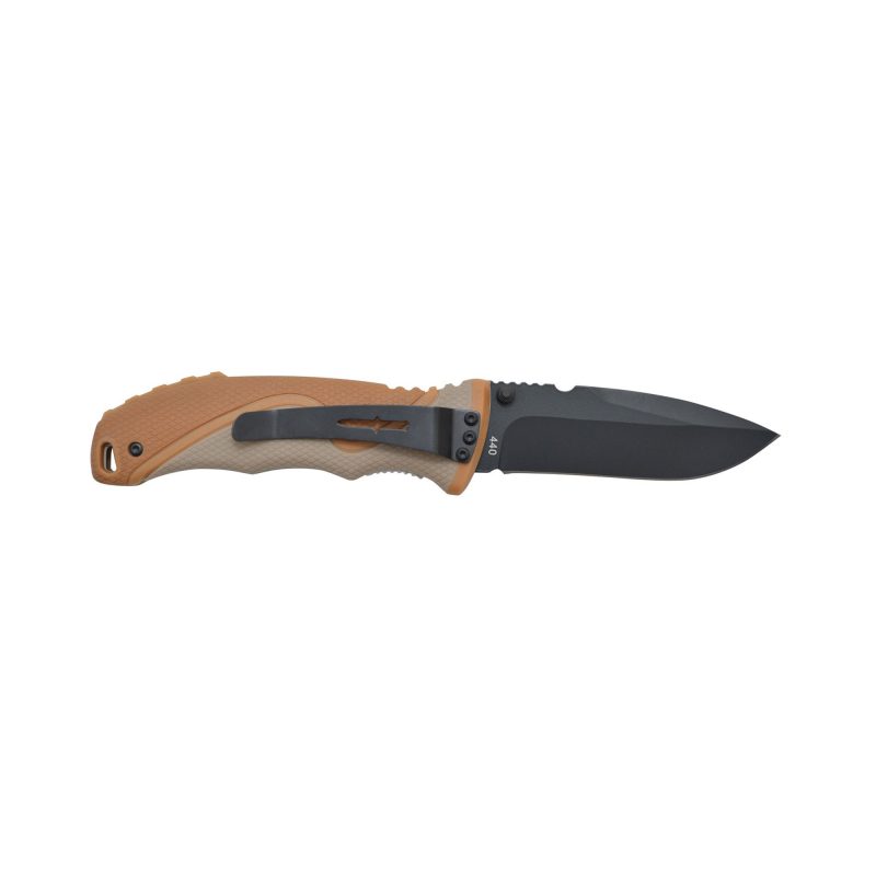 Camillus Inflame Drop Point folding knife with black blade and brown and tan ABS grip, shown closed on a rustic surface.