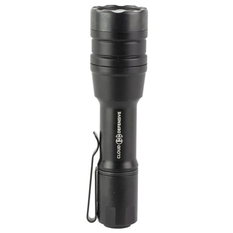 Cloud Defensive MCH Duty High-Output Light in black, held in a hand, illuminating a dark outdoor area, emphasizing its rugged construction.