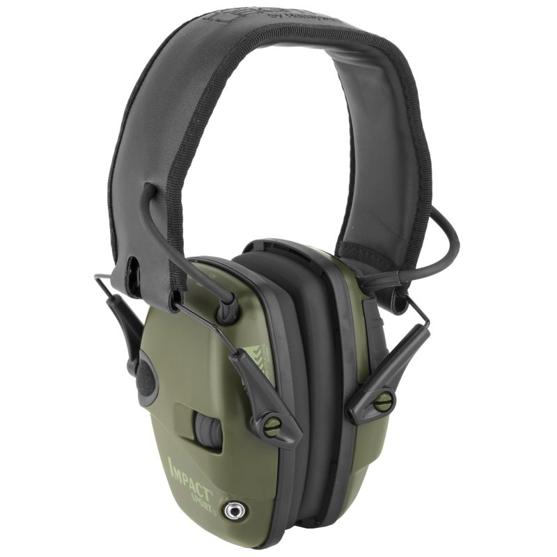 Howard Leight Impact Sport electronic earmuffs in olive drab green, folded, ready for use on a ranch or job site.
