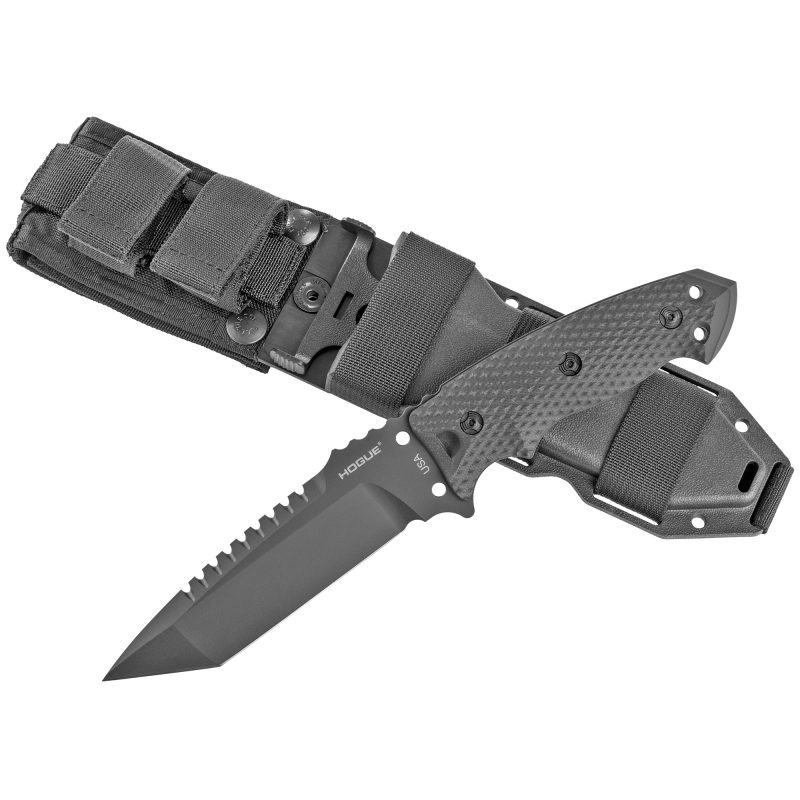 Hogue EX-F01 5.5 inch tanto fixed blade knife with black G10 handle, black Cerakote A2 tool steel blade, and retention sheath, displayed on a rugged outdoor surface.