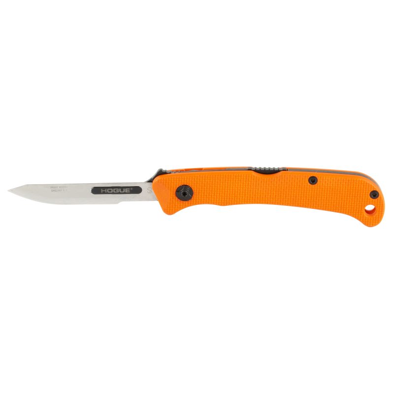 Hogue Expel Folding Knife with 2.5-inch silver replaceable blade and orange G-10 handle, shown open on a rustic surface.