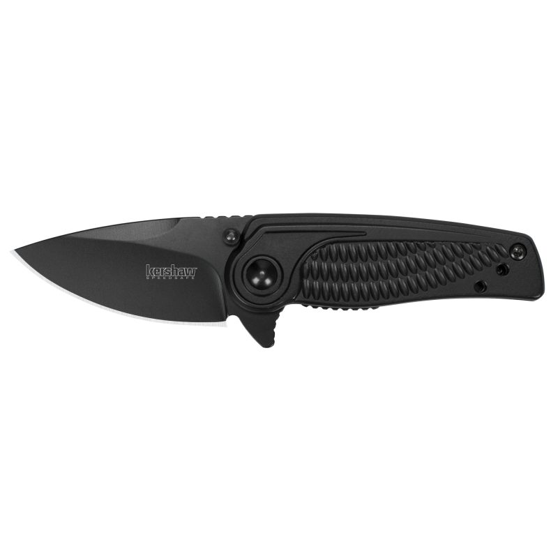 Kershaw Spoke 2 inch plain edge blackwash folding knife, closed, showing textured steel handle and pocket clip, on a rustic background.