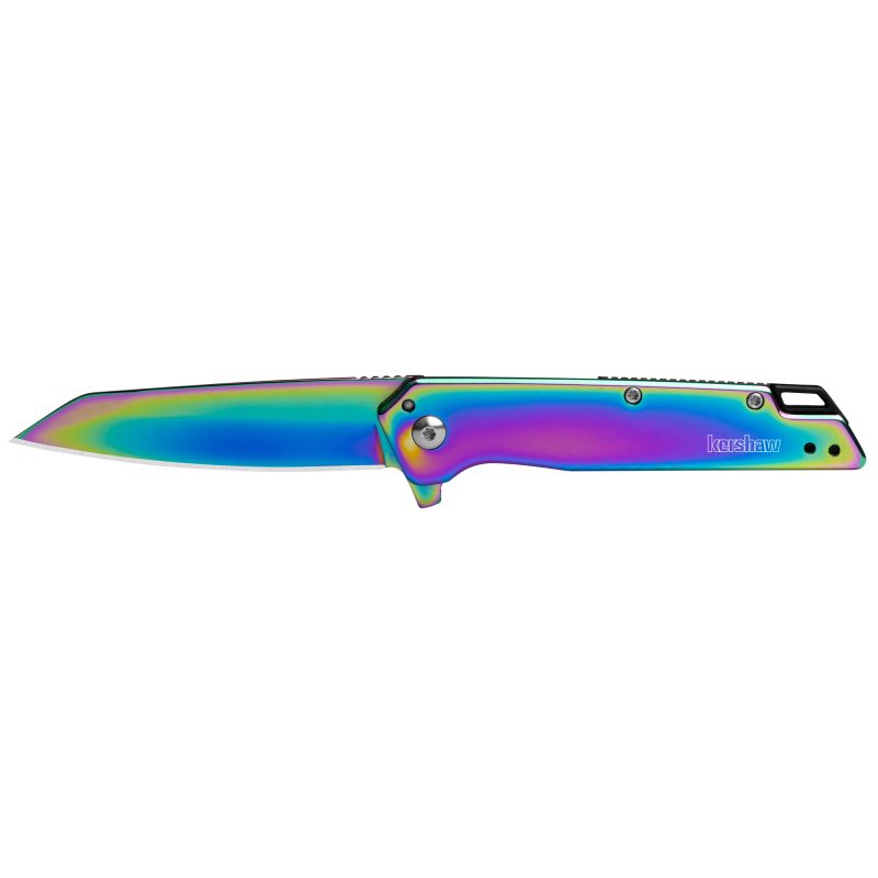 Kershaw Misdirect 3-inch folding knife with rainbow PVD finish, reverse tanto blade, and frame lock, shown open on a rustic surface.