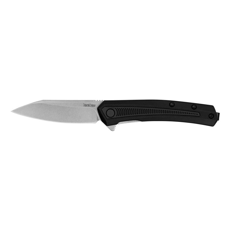 Kershaw Raygun 2.8 inch folding knife with stonewash silver reverse tanto blade and black glass-filled nylon handle, shown open on a rustic surface.