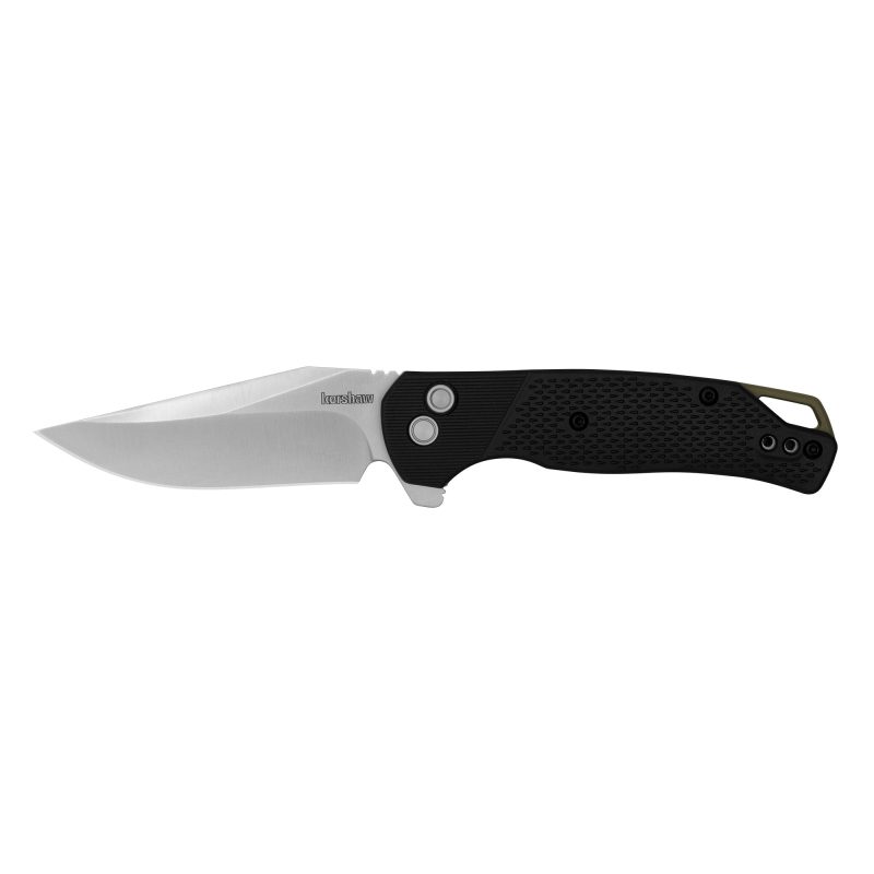 Kershaw Runoff folding knife with a black stonewashed clip point blade and black glass-filled nylon handle, shown open on a rustic surface.