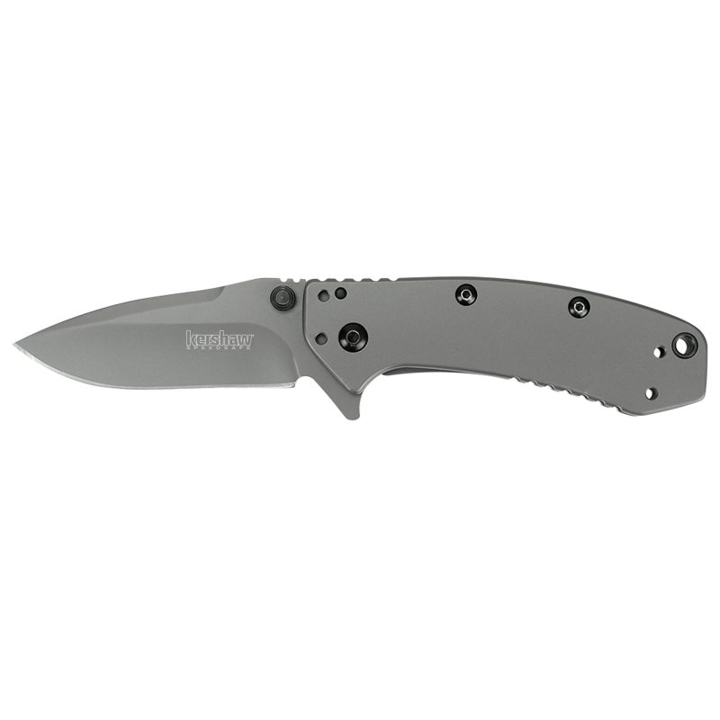 Kershaw Cryo 2.75 inch plain black assisted folding knife with a clip point blade, closed on a rustic wooden surface.