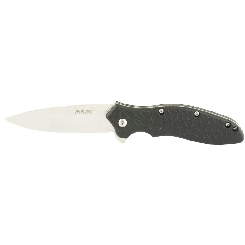 Kershaw Oso Sweet 3 inch plain satin drop point folding knife with SpeedSafe assisted opening, glass-filled nylon handle, and reversible pocket clip, shown open on a rustic surface.