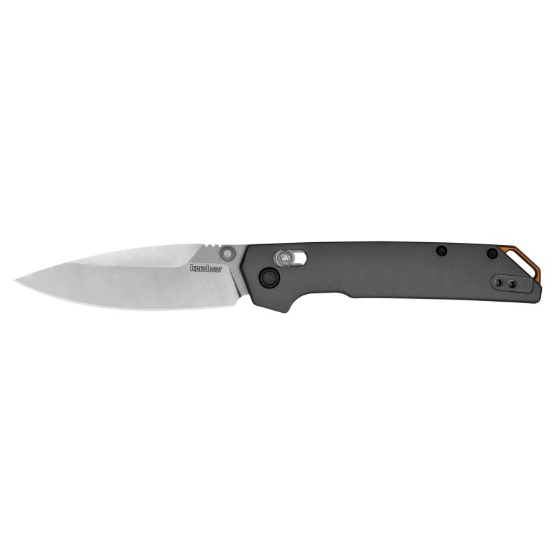 Kershaw Iridium folding knife with a gray anodized aluminum handle and a two-tone D2 tool steel spear point blade, shown open on a rustic surface.