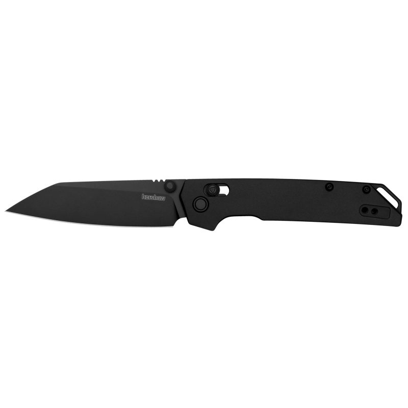 Black Kershaw Iridium folding knife with a 3.45-inch reverse tanto D2 steel blade, shown open on a rugged surface.