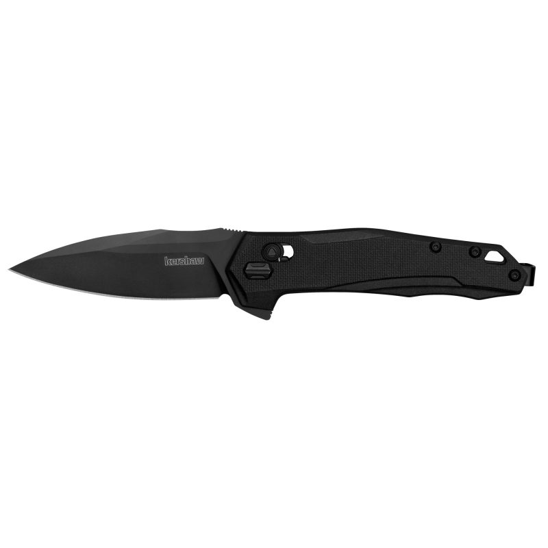 Kershaw Monitor 3 inch black oxide folding knife with D2 tool steel blade and glass-filled nylon handle, shown open on a rustic surface.