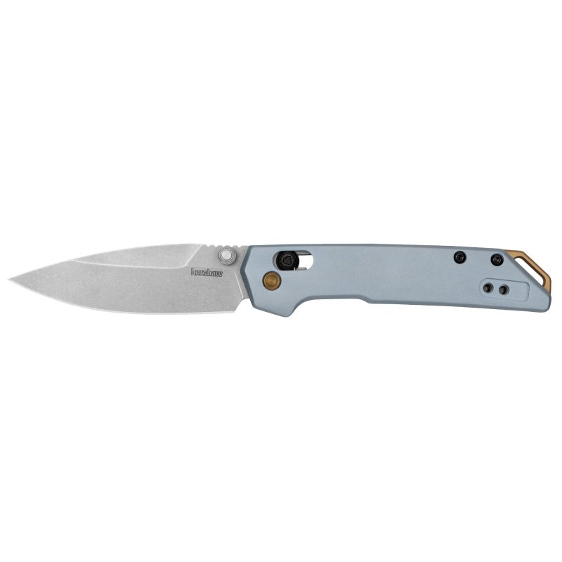 Kershaw Mini Iridium folding knife with a silver D2 spear point blade and an ice blue aluminum handle, shown open on a rustic wooden surface.