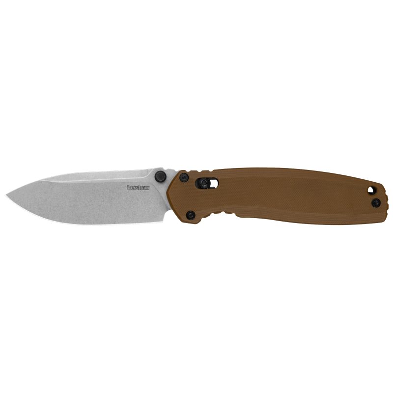Kershaw Broadside folding knife with a silver spear point D2 steel blade and a flat dark earth G-10 handle, shown open on a rustic surface.