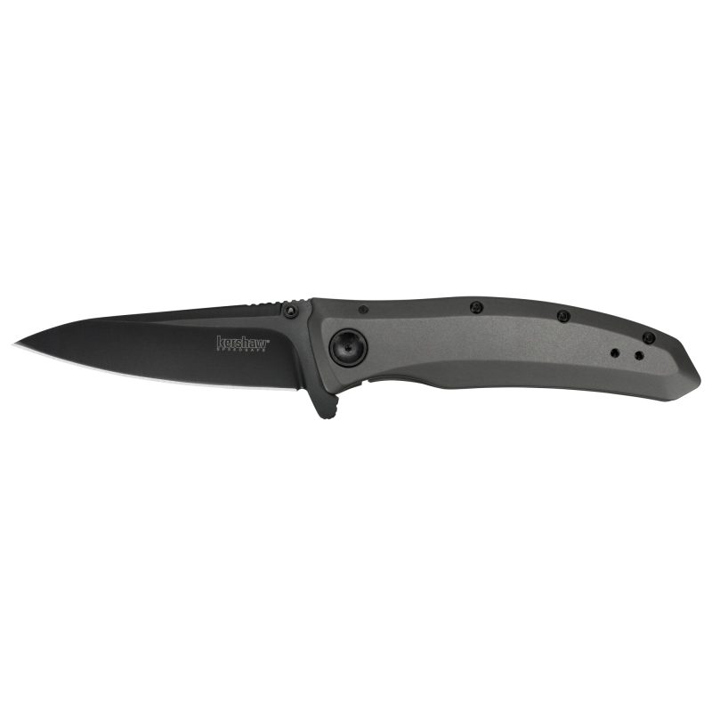 Kershaw Grid 3.7 inch black-oxide folding knife with a plain drop-point blade, shown open on a rustic background.