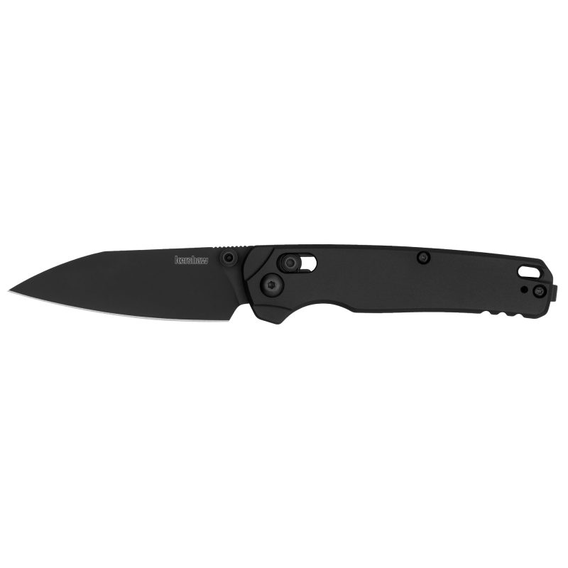 Kershaw Bel Air folding knife with a silver 3.1-inch reverse tanto blade and marbled carbon fiber handle, shown open on a rustic surface.