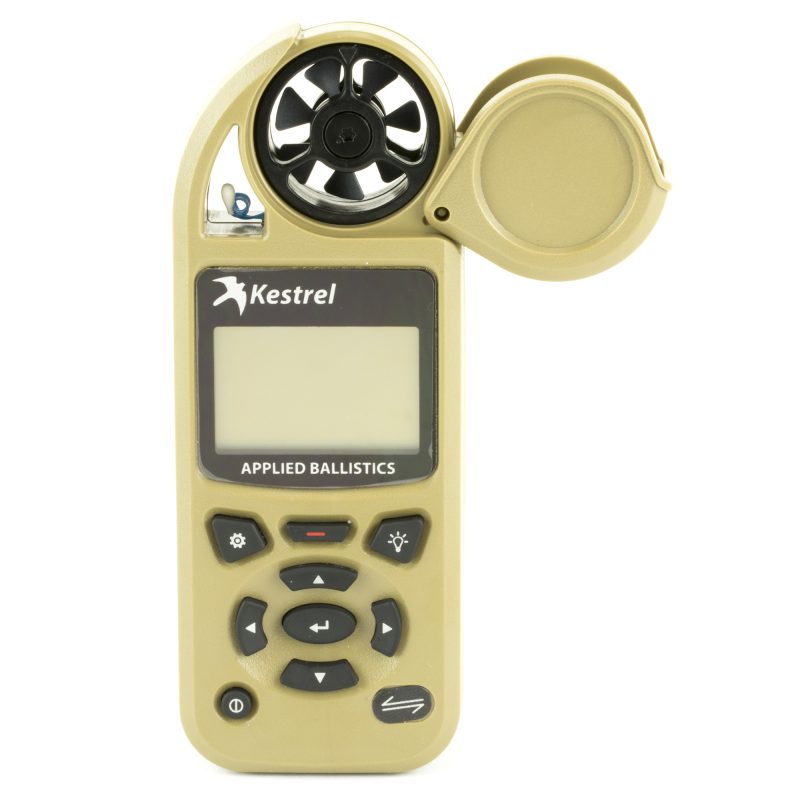 Kestrel Elite Weather Meter in desert tan with Applied Ballistics and Link wireless connectivity, displayed on a rugged outdoor surface.