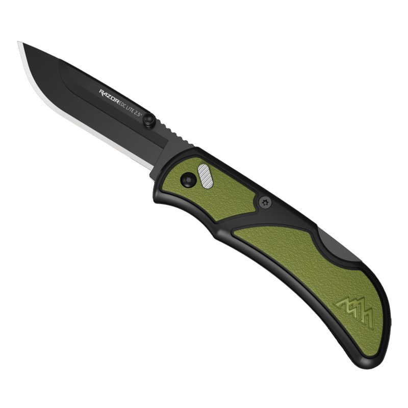 Outdoor Edge Razor-EDC Lite folding knife with an olive drab green handle and a black oxide coated 2.5-inch drop point blade, shown open on a rustic surface.
