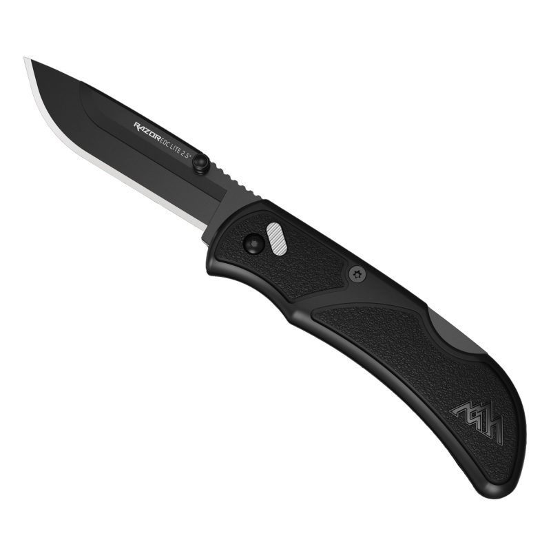 Outdoor Edge Razor EDC Lite folding knife with a black handle and black oxide coated 2.5-inch drop point blade, shown open on a rustic surface.