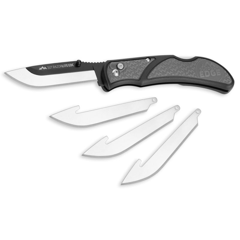 Outdoor Edge Razor-Lite EDC folding knife with gray and black handle, 3-inch plain edge blade, and extra replacement blades, shown on a rustic surface.