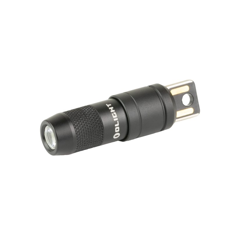 Black Olight Imini 2 mini rechargeable flashlight, 50 lumens, shown attached to a metal surface.