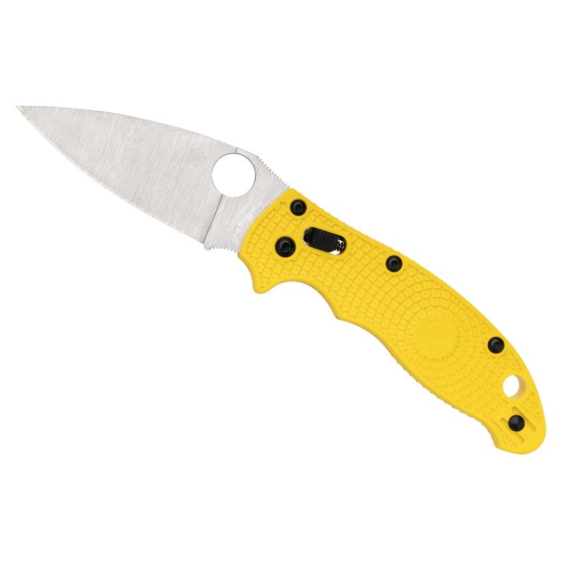 Spyderco Manix 2 Lightweight Salt folding knife with a yellow FRCP handle and a satin finish CPM MagnaCut plain edge blade, shown open on a rustic surface.