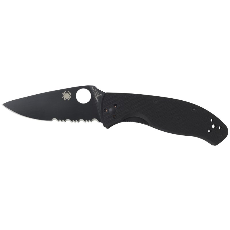 Spyderco Tenacious G-10 Combo Blk folding knife with black G10 handle and combo edge blade, shown open on a rustic background.