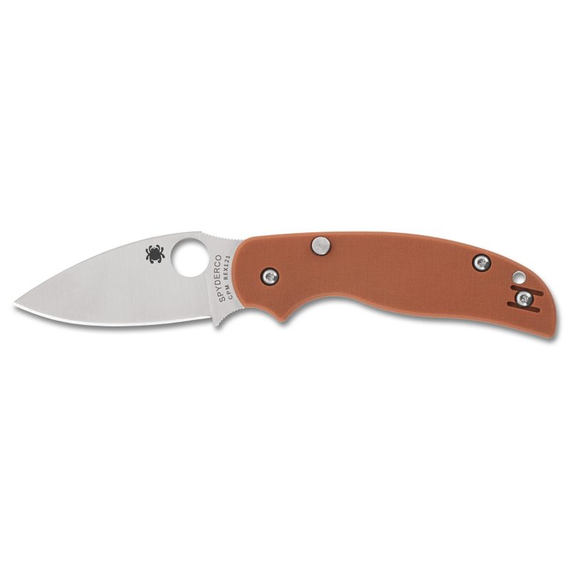 Spyderco Sage 6 folding knife with a 3-inch satin finish CPM REX 121 drop point blade and burnt orange G-10 handle, shown open on a rustic surface.
