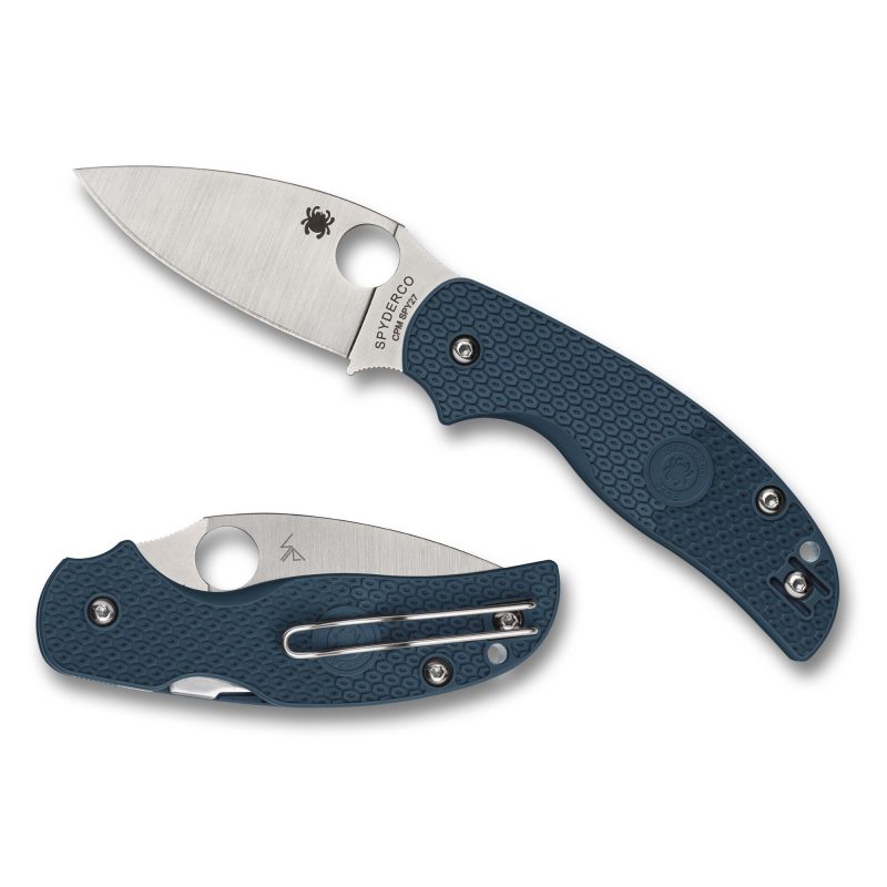 Spyderco Sage 5 Lightweight folding knife with a silver satin finish 3-inch drop point blade and a blue FRN handle, shown open on a rustic background.