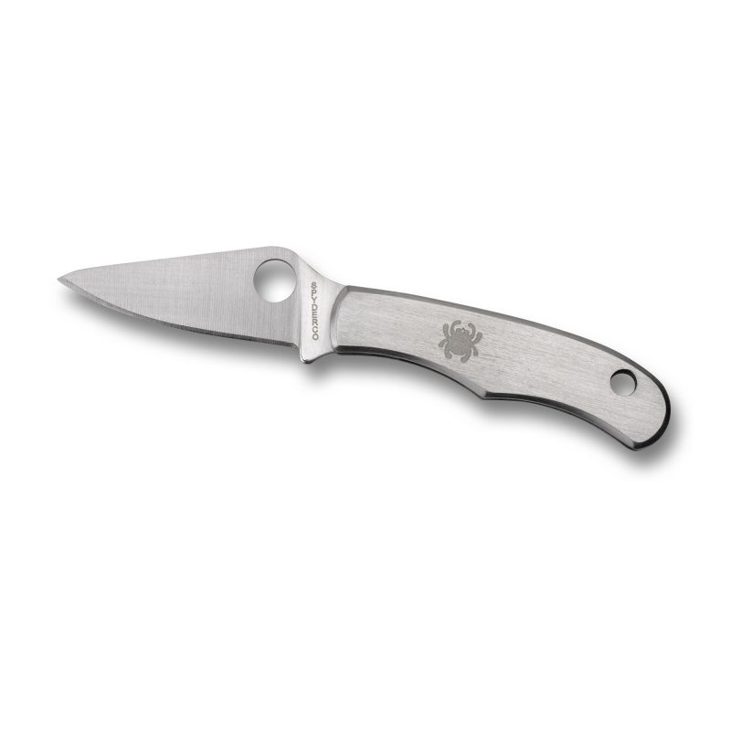 Close-up of a closed Spyderco Bug 1.27 inch plain edge folding knife with a stainless steel handle and blade, shown against a rustic background.