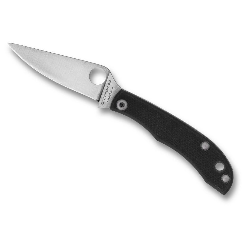 Spyderco Honeybee G-10 folding knife with a silver drop point blade and black textured G-10 handle, shown open on a rustic surface.
