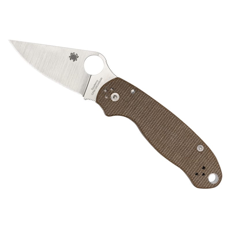 Spyderco Para 3 folding knife with a brown canvas Micarta handle and satin CPM CRU-WEAR steel plain edge blade, shown open on a rustic wood surface.