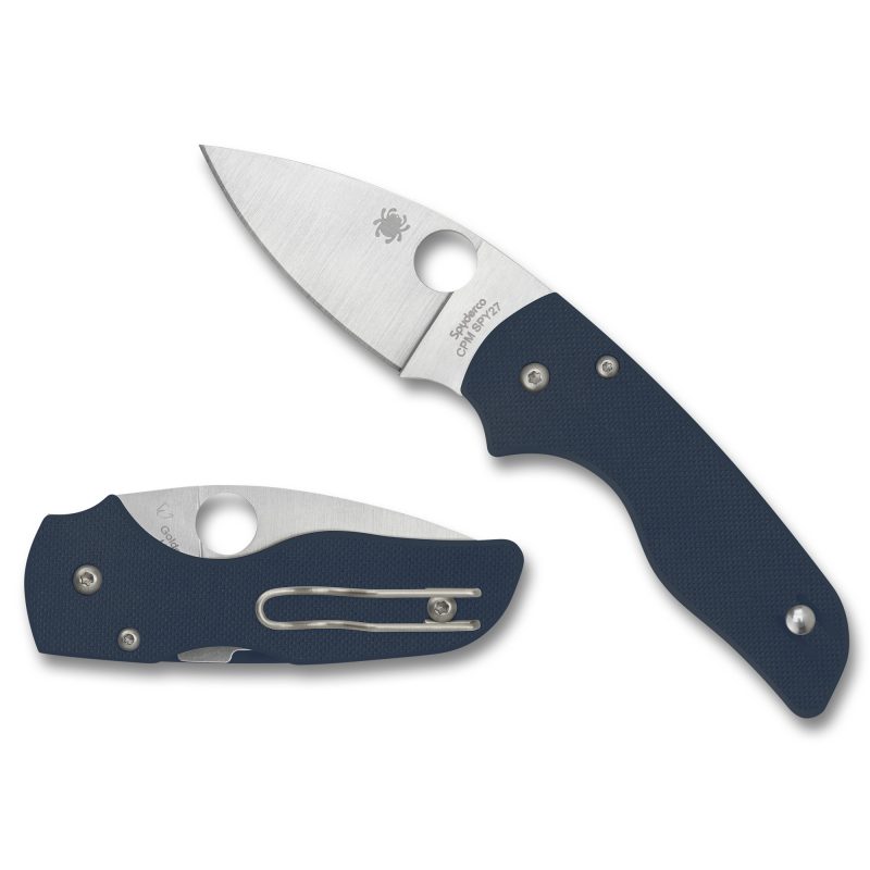 Spyderco Lil Native G-10 folding knife with a blue handle and silver drop point blade, shown open on a rustic surface.