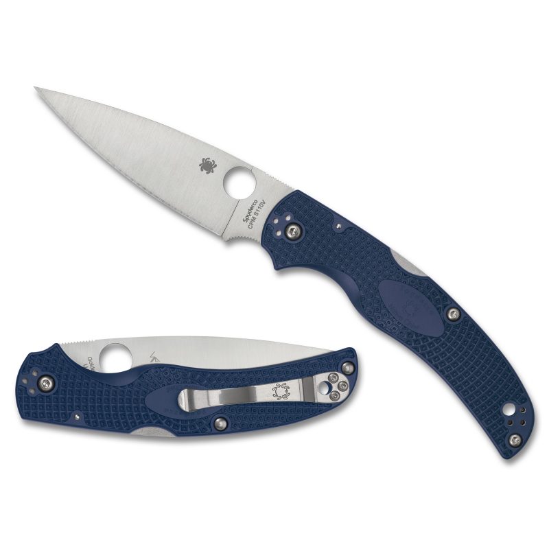Blue Spyderco Native Chief Lightweight folding knife with a satin-finished drop point blade, open on a rustic wooden surface, highlighting its durable construction.