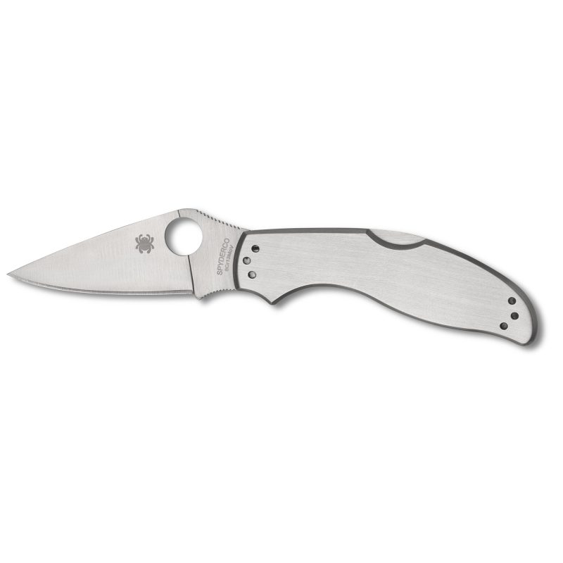 Spyderco Uptern folding knife with a 2.82-inch satin-finished clip point 8Cr13MoV stainless steel blade and a silver stainless steel handle, shown open on a rustic background.