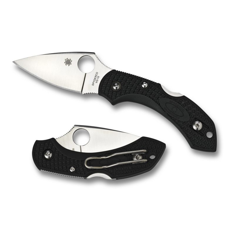 Spyderco Dragonfly2 Black FRN Plain Edge folding knife with a VG-10 blade and black textured handle, shown open on a rustic surface, ready for use.