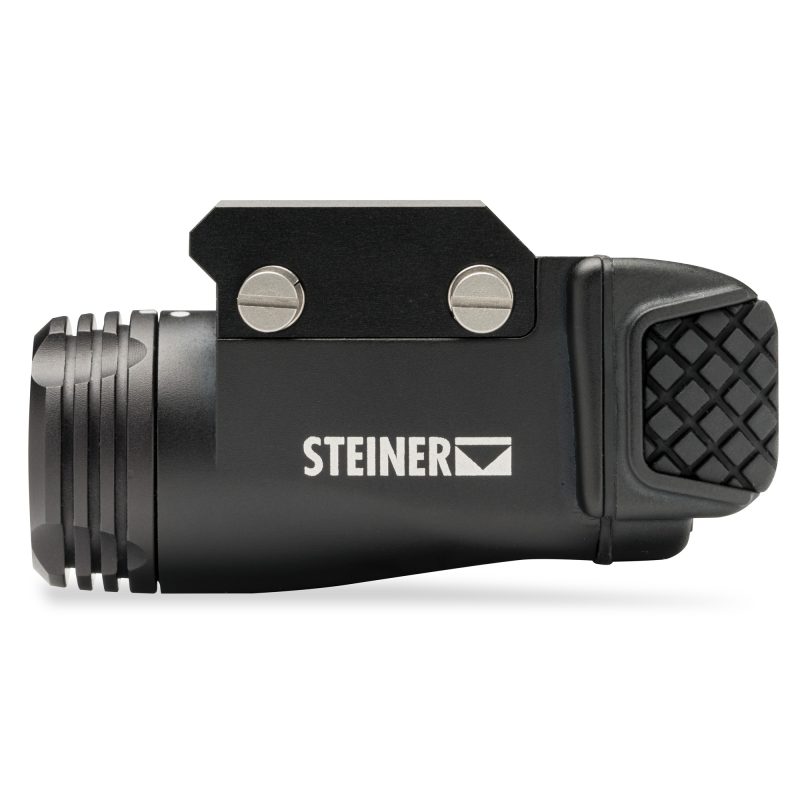 Steiner TOR Fusion pistol light and green laser combo, black, mounted on a handgun rail.