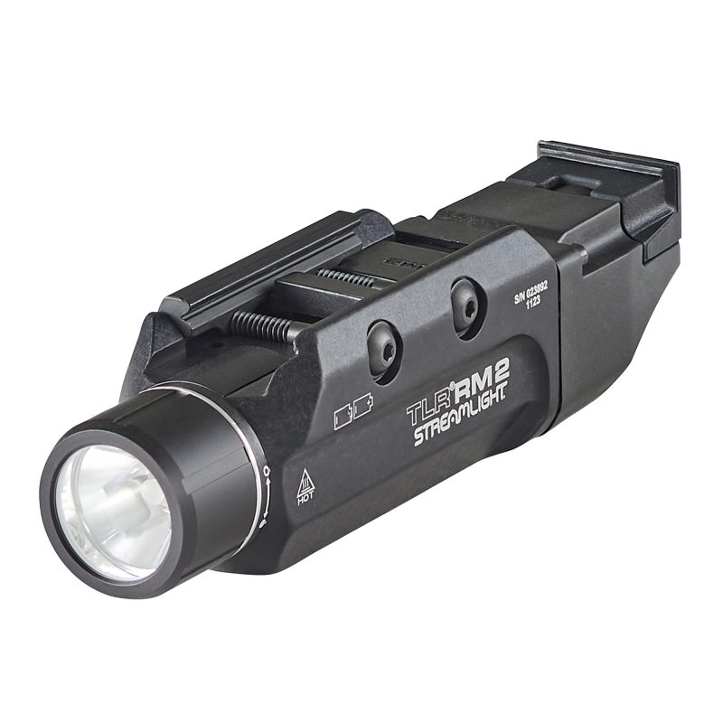 Black Streamlight TLR RM 2 weapon light mounted on a firearm, showing the lens and controls.