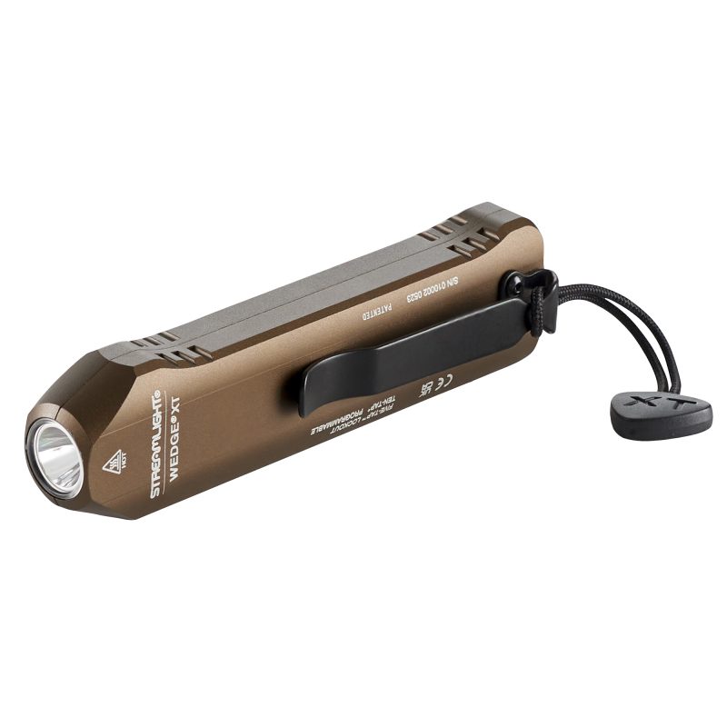 Black Streamlight ProTac HL 6 flashlight with USB-C rechargeable batteries and lanyard, shown against a rugged outdoor background.