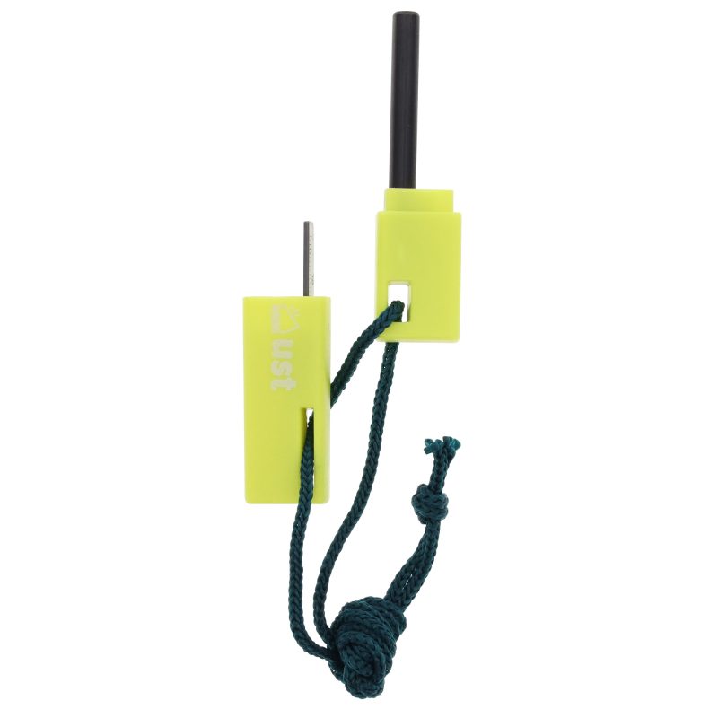 Orange UST SparkForce Fire Starter, a compact flint-based tool, shown ready for use on a rugged outdoor surface.