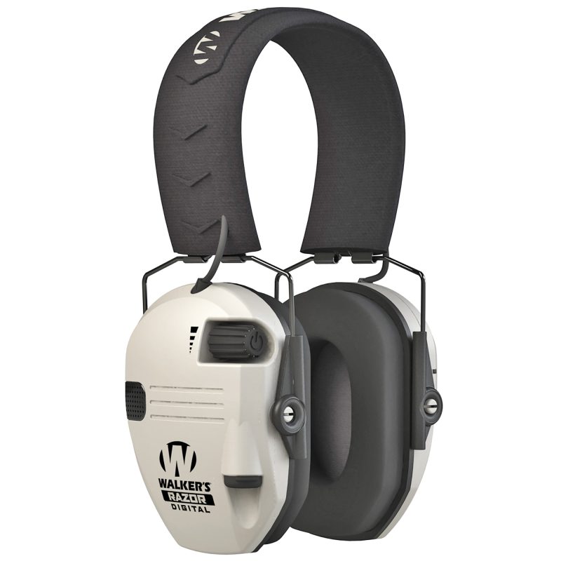 Walker's Razor X-TRM Digital Ear Muffs in bone color, shown protecting ears during outdoor ranch work in the White Mountains of Arizona.