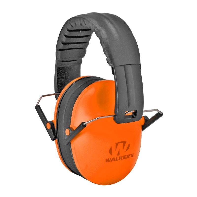 Walker's Ultra Compact Muff in bright orange, folded for storage, on a rugged outdoor surface.