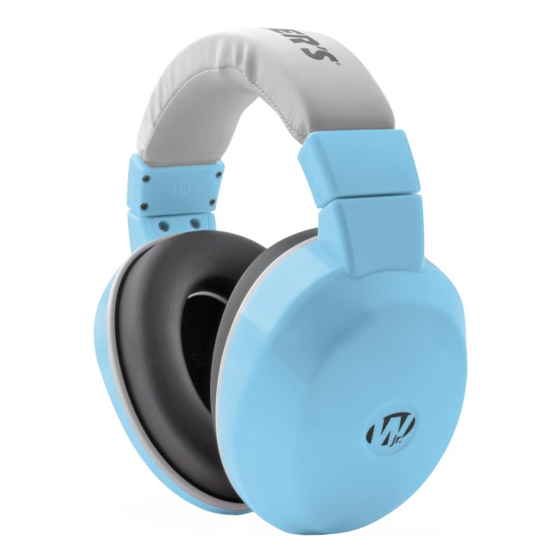 Walker's Ultra Compact Muff Blue, a pair of baby blue passive ear muffs designed for small shooters, shown on a rugged outdoor background.