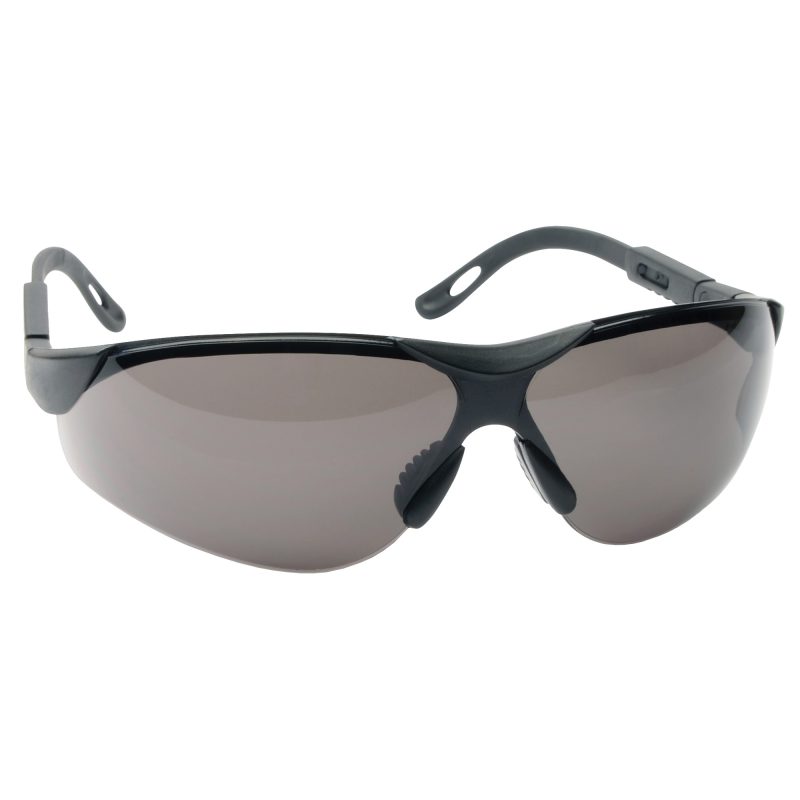 A pair of Walker's Elite Sport Glasses with ICE tinted polycarbonate lenses, shown against a rugged outdoor background, ready for use on a ranch.